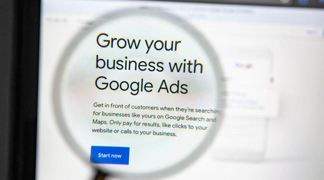 UK SEO agency - Google Ads website under a magnifying glass